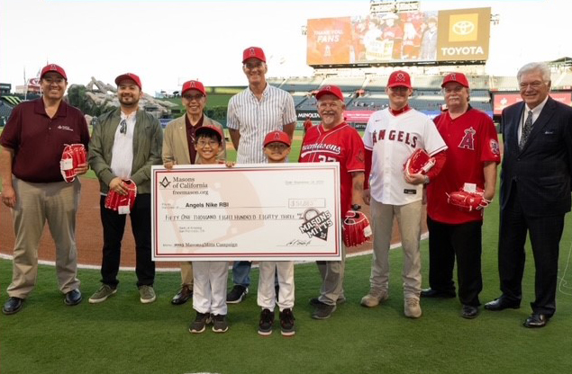 California Masons present a check at Angels Stadium