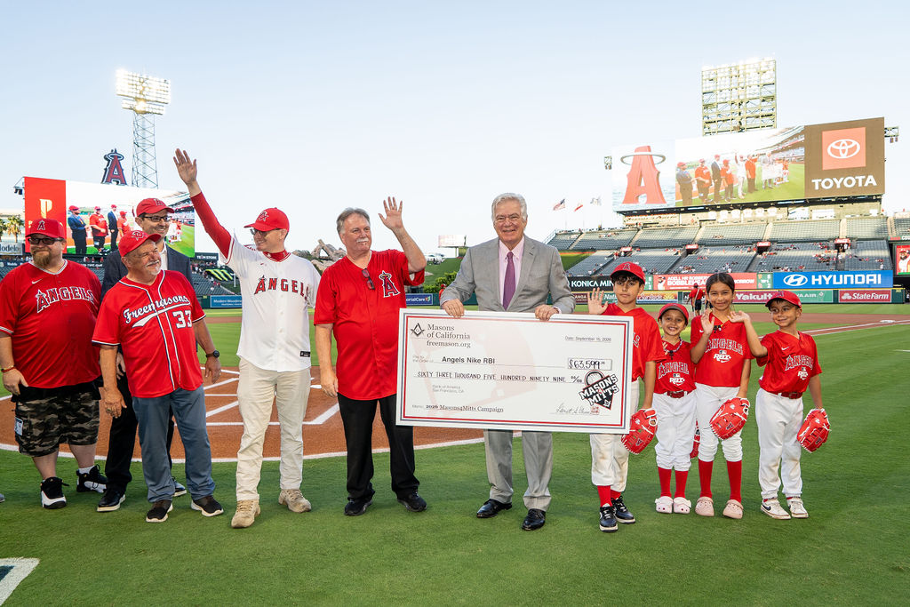 The Masons of California present a $63,599 check to the Los Angeles Angels as part of the Masons 4 Mitts campagin before taking in a game Tuesday, September 15, 2026 in Anaheim, CA.