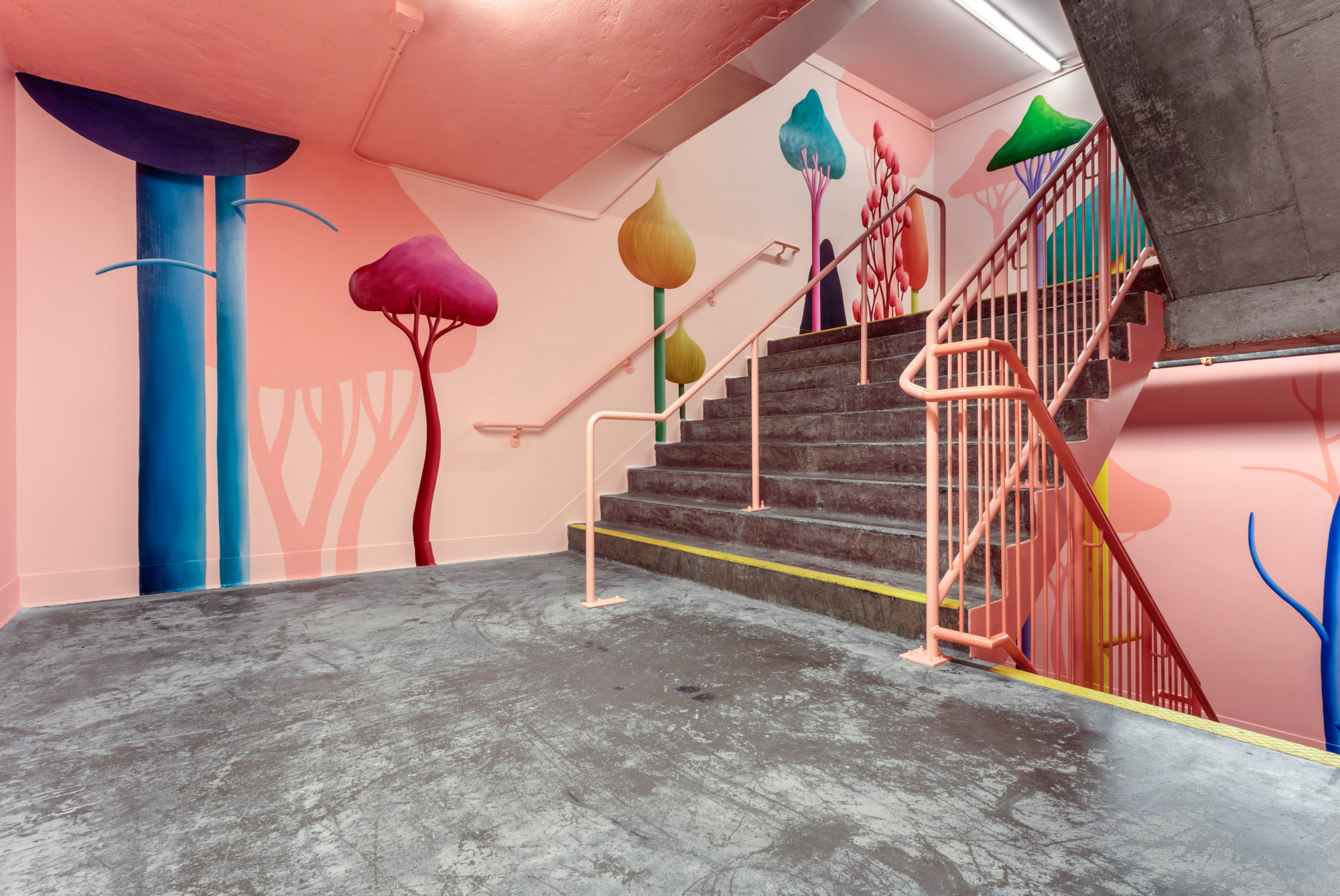 The stairwell of the former temple is now home to four-story artwork by Nicolas Party.